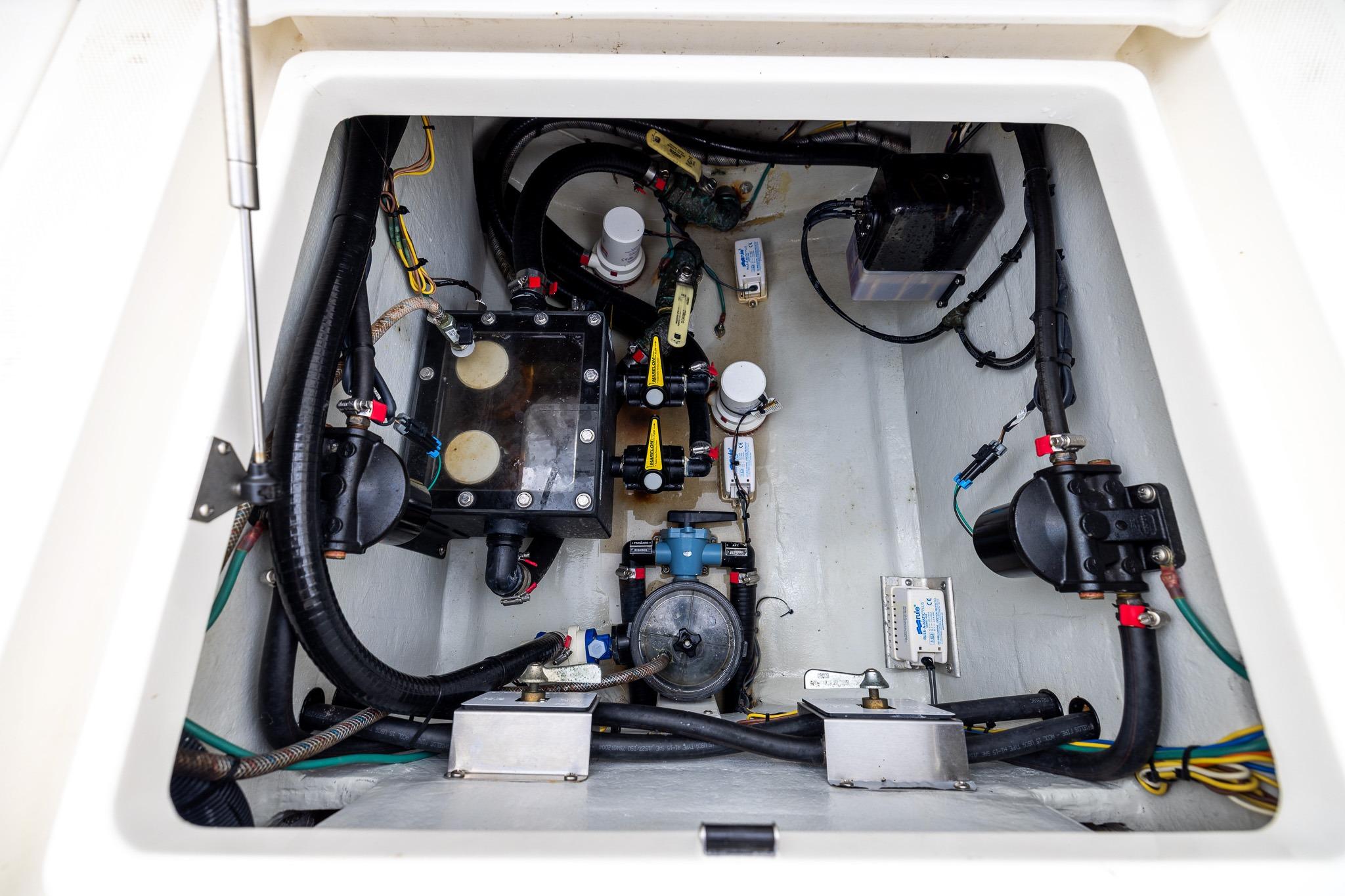 2019 SeaVee 322Z boat engine compartment with various mechanical components and wiring.