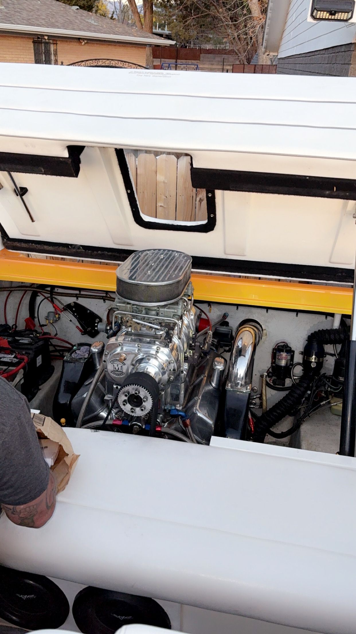 The engine compartment of a 2001 Advantage 27 Victory boat with a powerful engine.