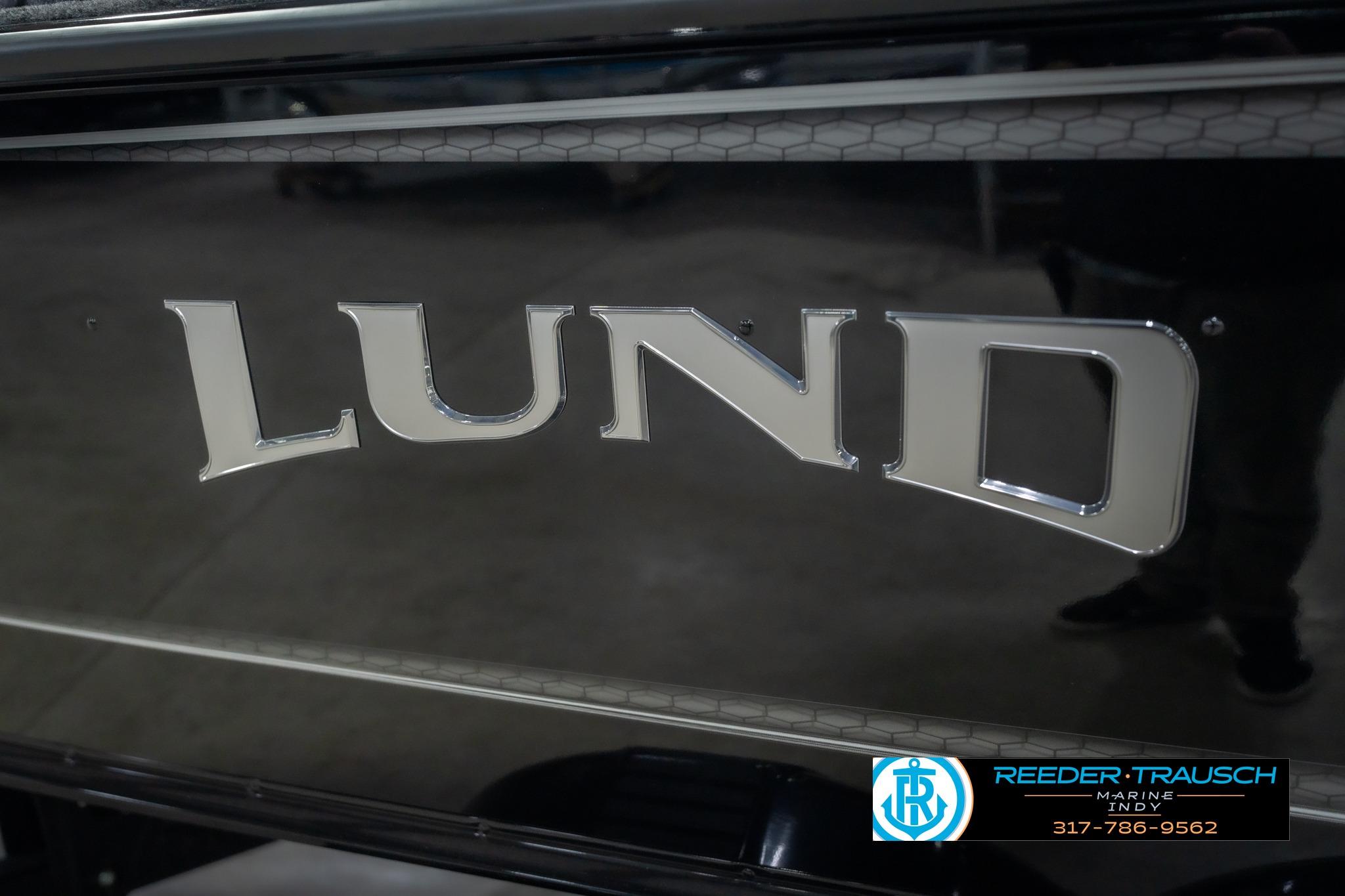 2026 Lund 2075 Impact XS boat logo with Reeder-Trausch Marine contact details.