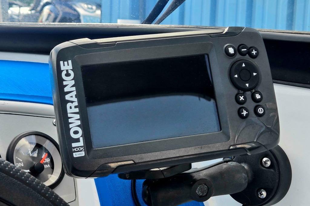 Lowrance fish finder on 2018 Tahoe 450 TS boat dashboard.