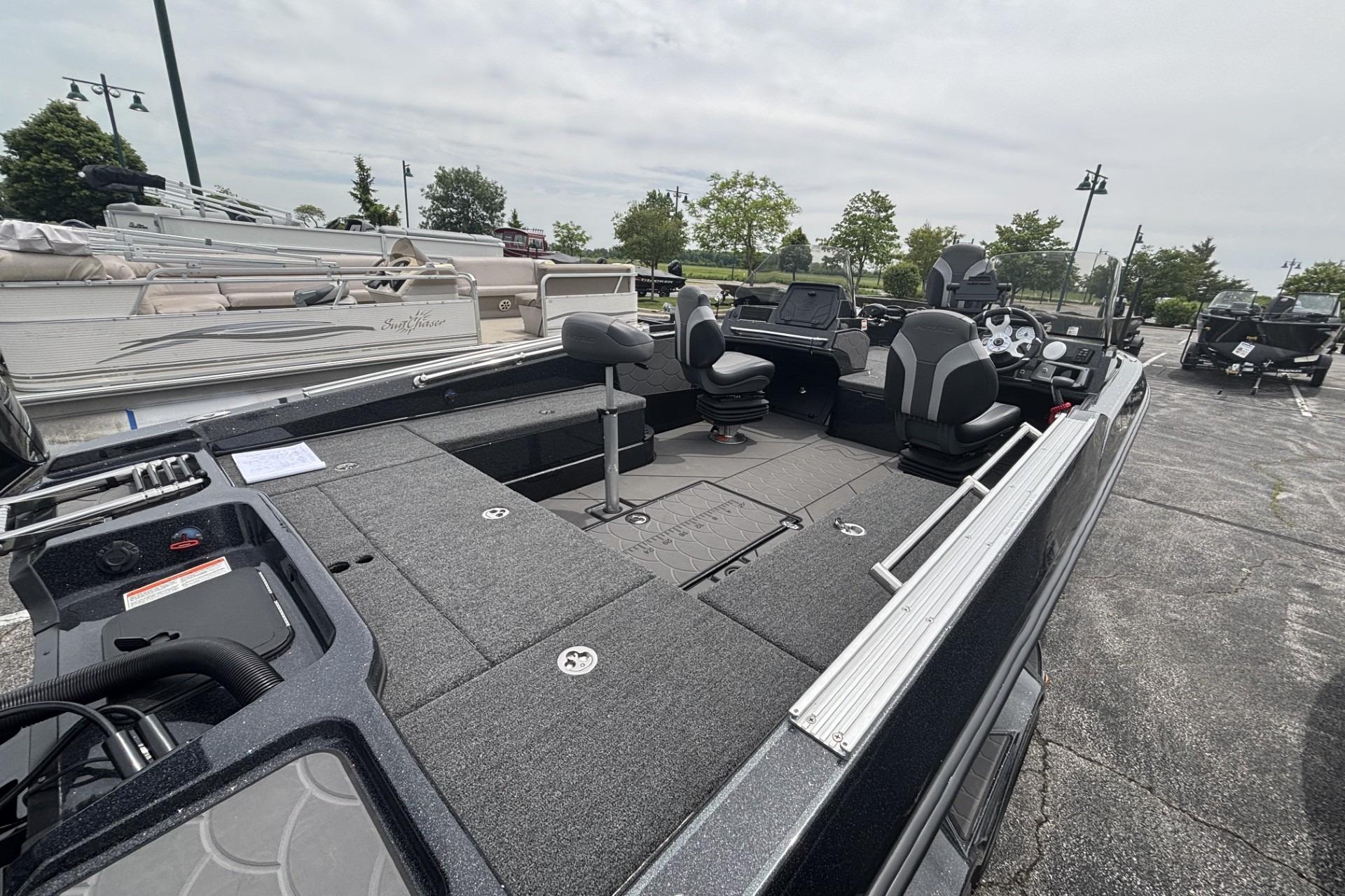 2026 Nitro ZV21 fishing boat with spacious deck and modern seating.