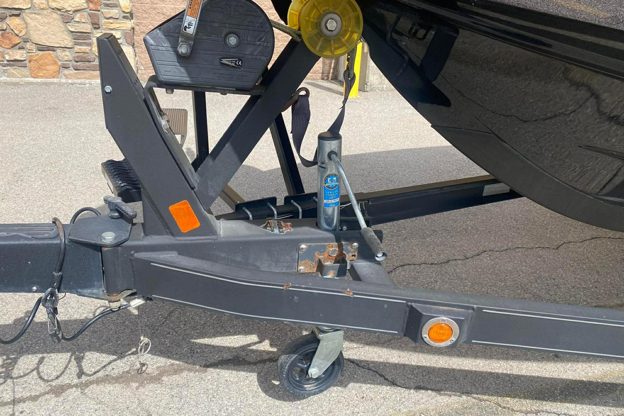 Trailer hitch of a 2017 Ranger 621FS Fisherman boat on pavement.