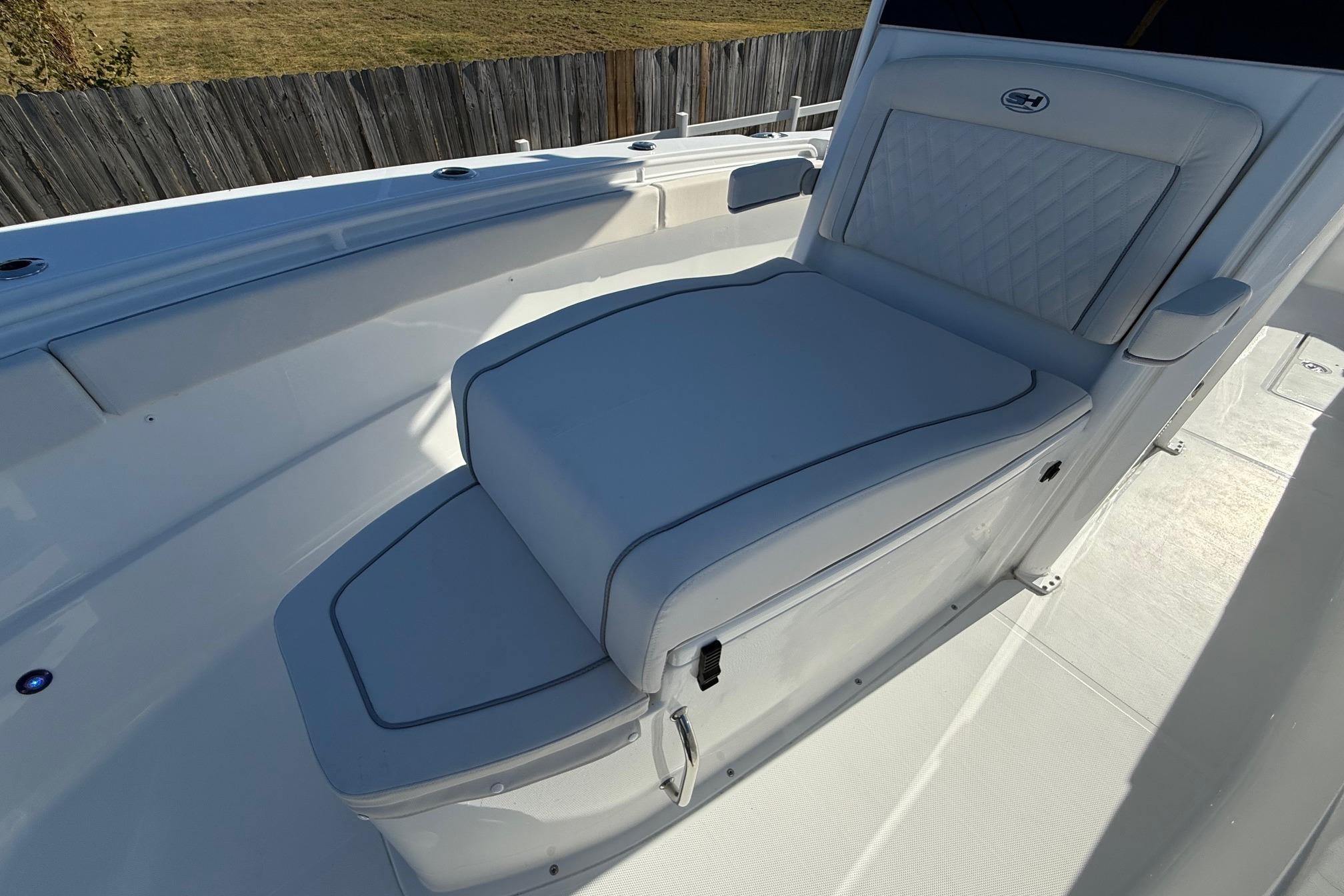 2026 Sea Hunt Ultra 275 Coffin Box boat interior with cushioned seating.