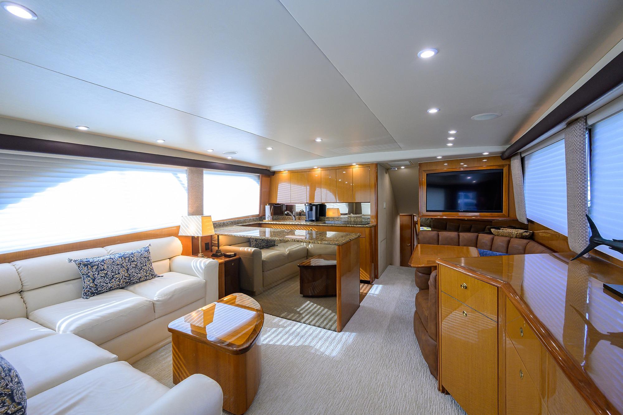 Luxurious interior of a 2004 Viking 56 Convertible yacht with elegant furnishings.