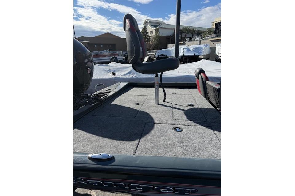2026 Ranger RT198P boat deck with seating, under a partly cloudy sky.