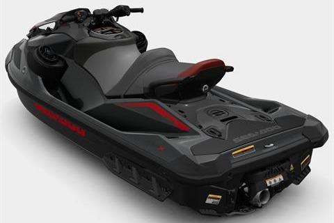 2026 Sea-Doo GTR-X 300 jet ski, sleek black design with red accents, rear view.