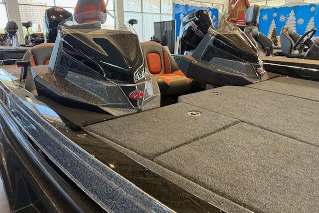 2025 Ranger Z518 Cup-Equipped boat with sleek design and spacious deck in showroom.