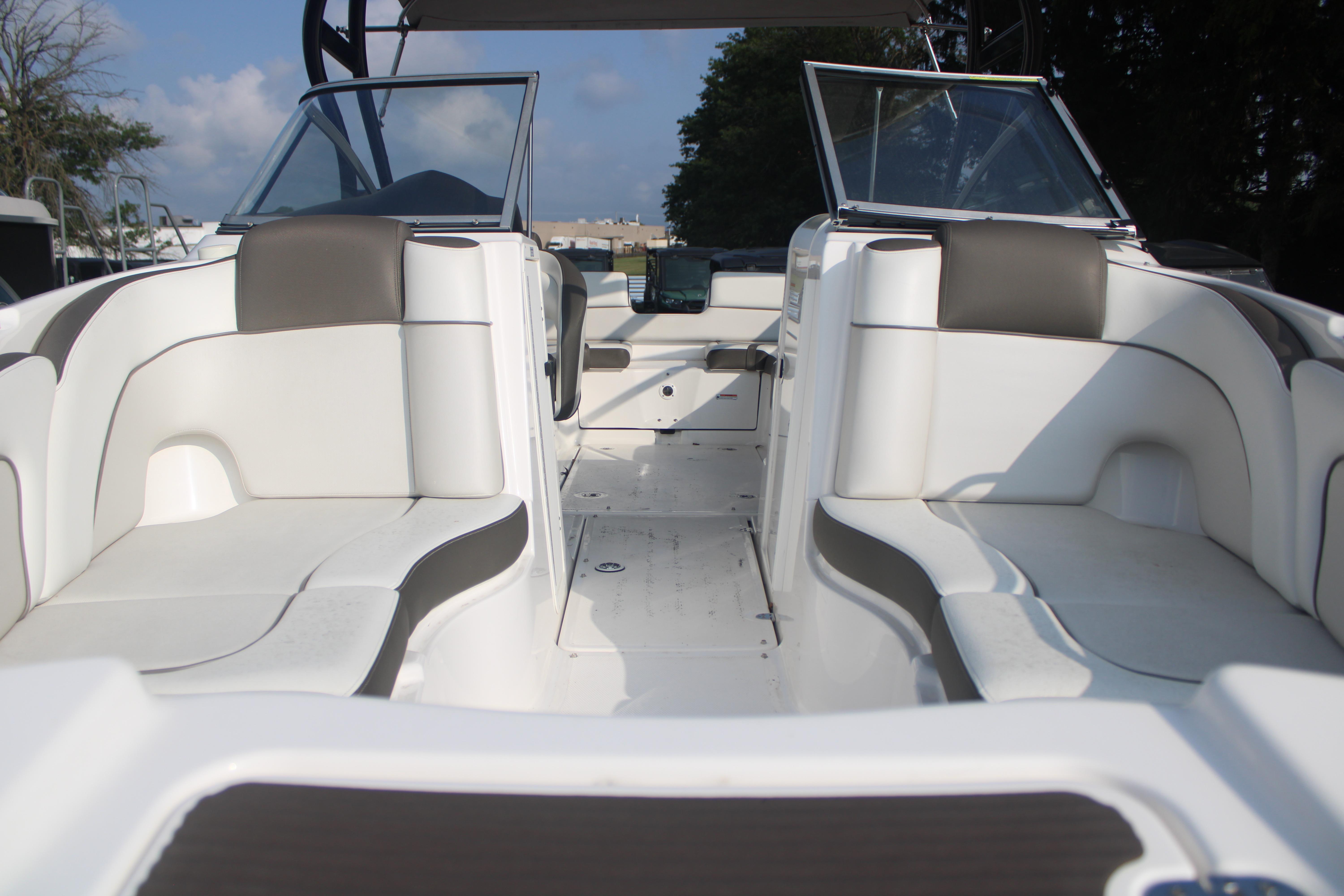 2013 Yamaha Boats 242 Limited S interior with white seating and open cockpit design.
