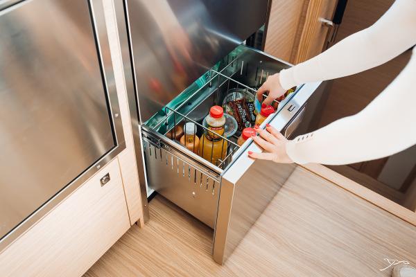Modern kitchen drawer with beverages on Nautitech 44 Open, 2025 model yacht.