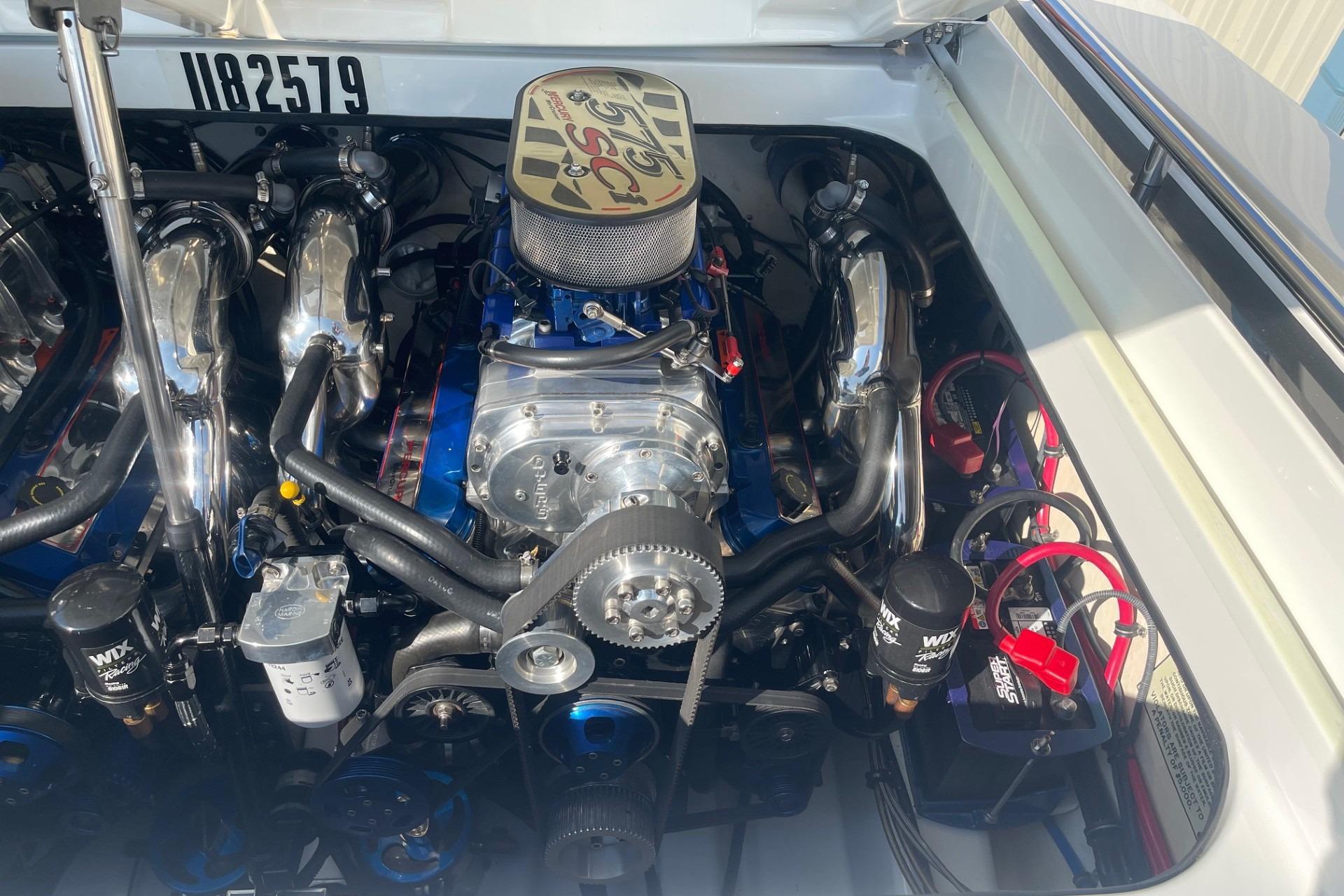 Engine compartment of a 2004 Formula 382 FASTech boat, showcasing detailed components.