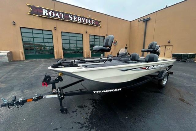 2026 Tracker Pro 170 boat on trailer outside boat service center.