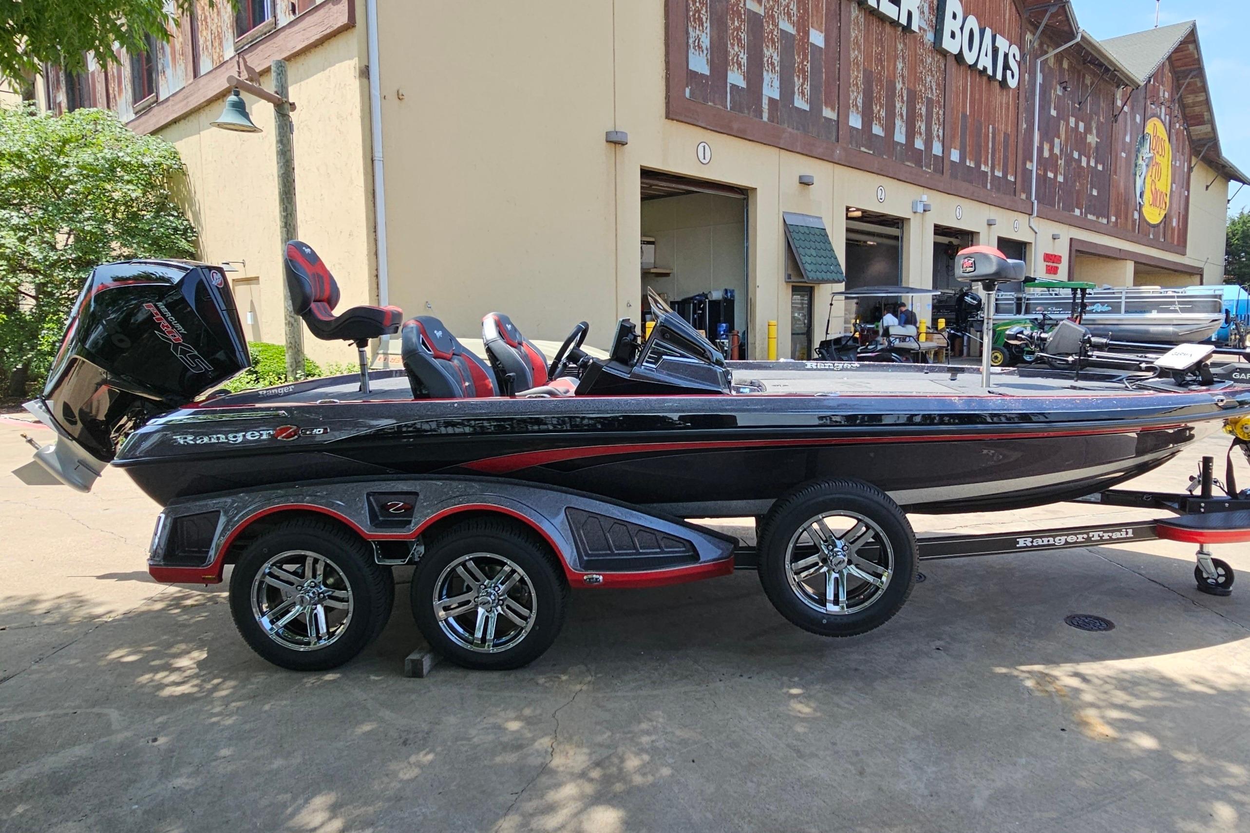 2026 Ranger Z520R boat parked outside a dealership, showcasing sleek design and modern features.