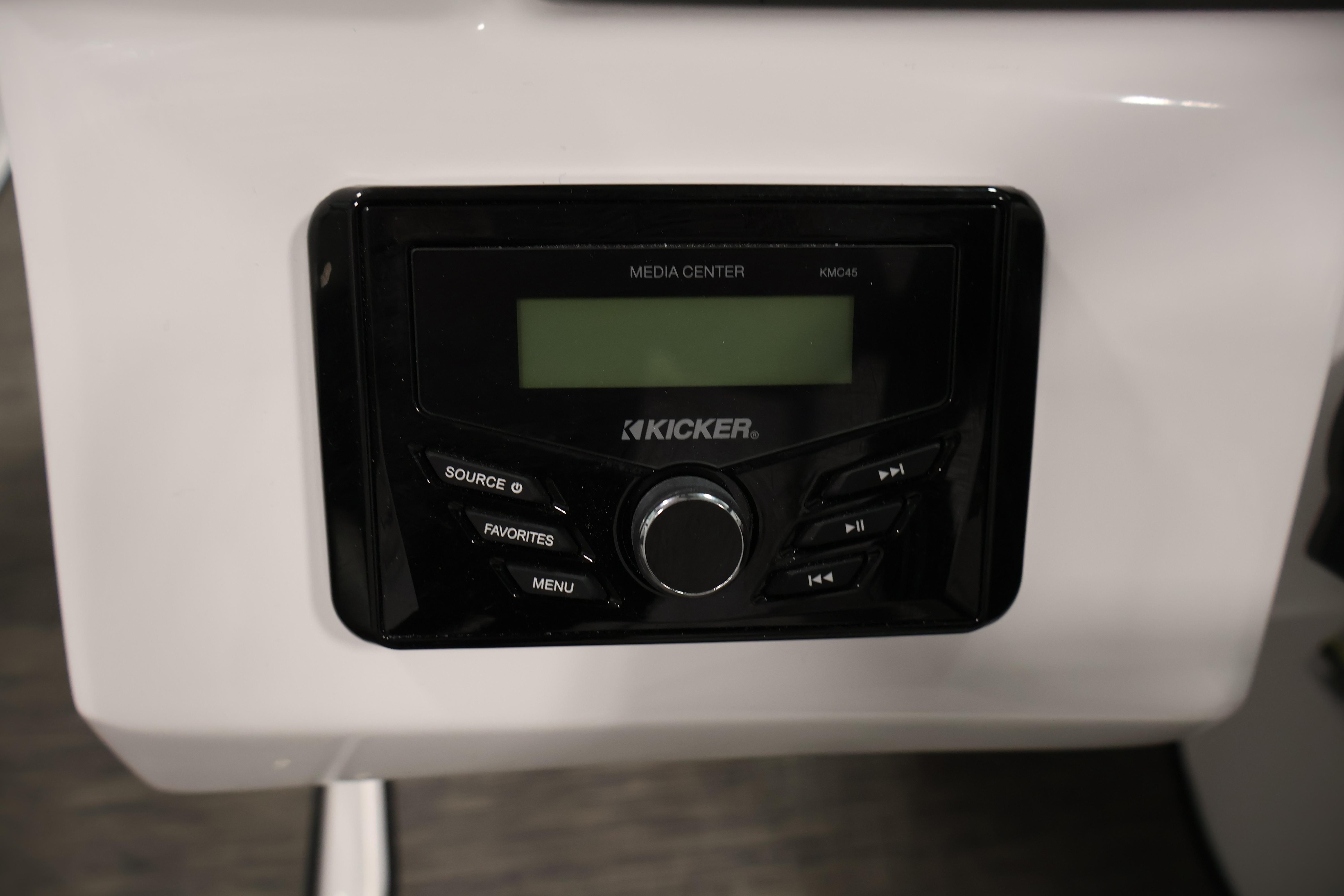 Kicker media center in 2026 Four Winns H4 Freedom boat dashboard.