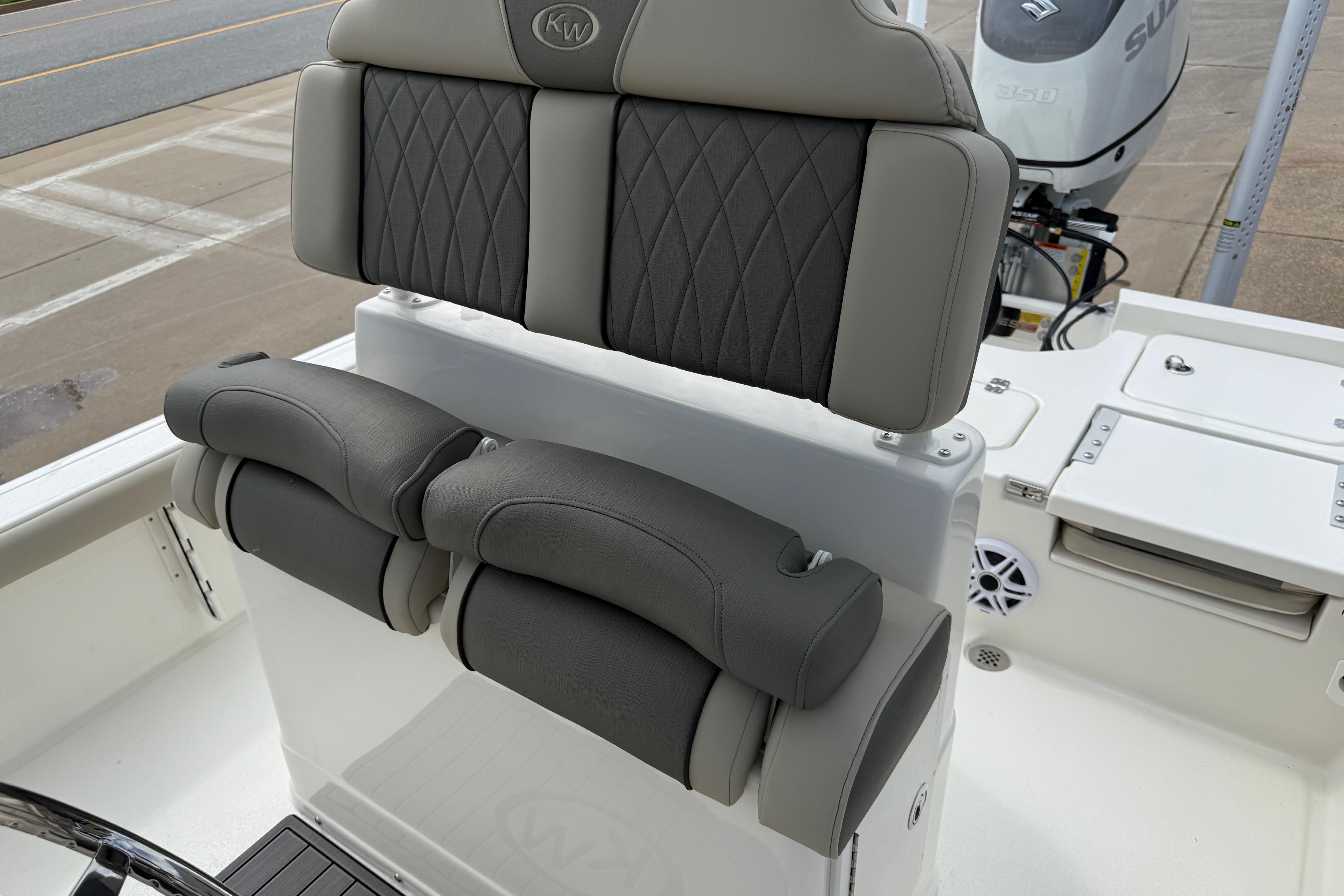 2026 Key West 250 Bay Reef boat seating with gray upholstery and diamond stitching.