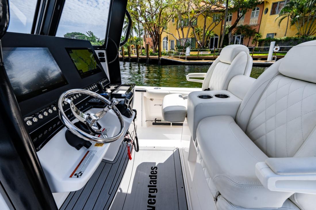 2021 Everglades 295 Center Console boat interior with luxurious seating and advanced navigation controls.