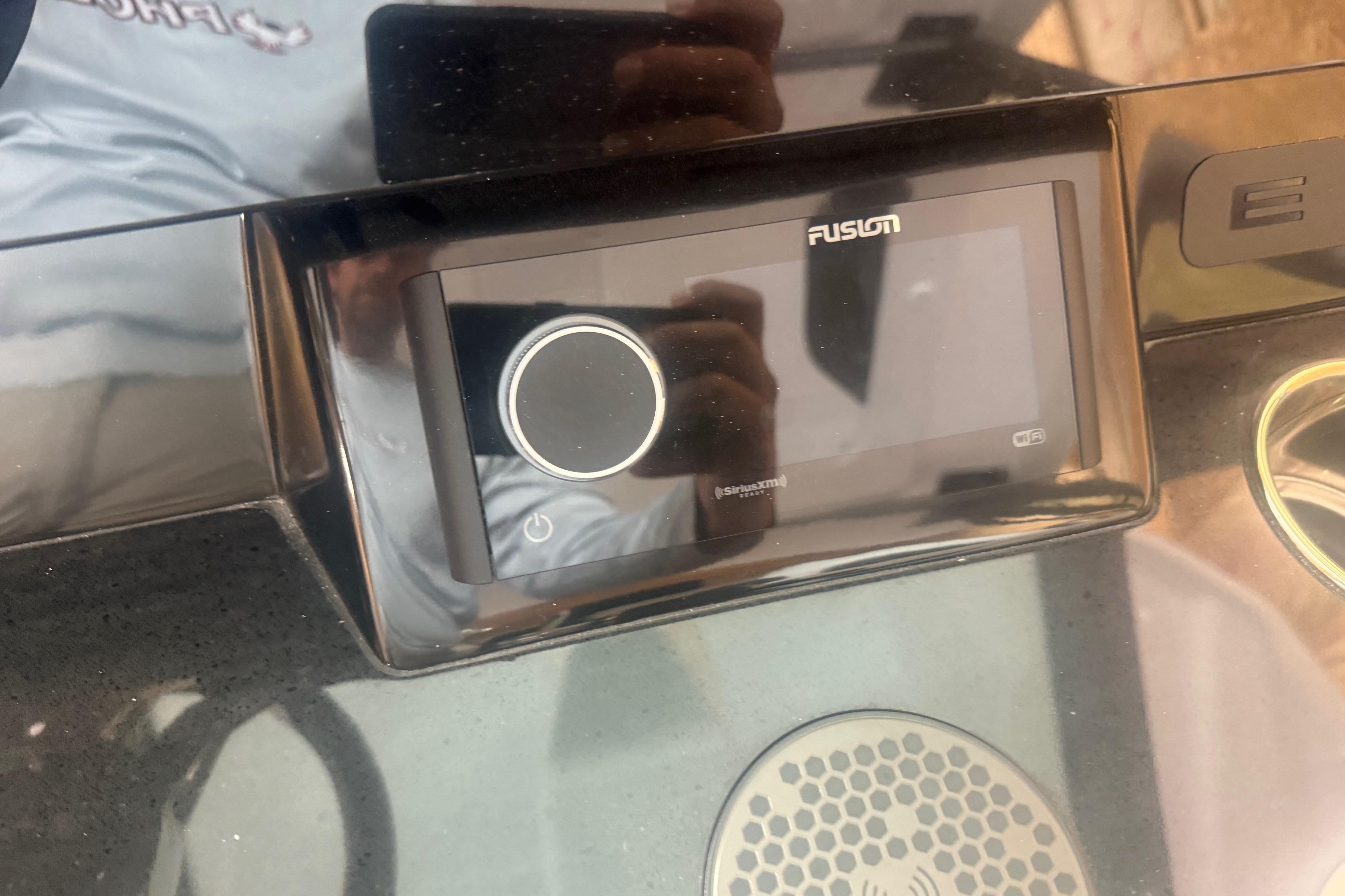 Fusion audio system on 2027 Monterey Elite 27 SD boat dashboard.