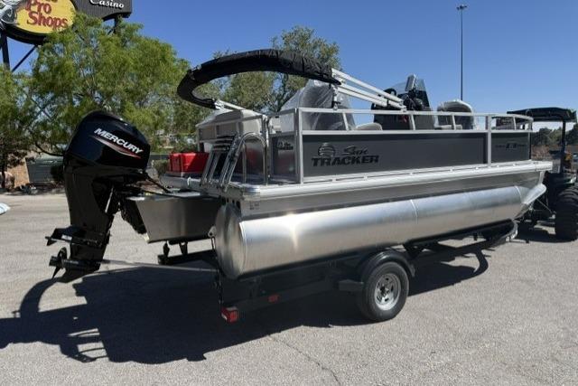 2026 Sun Tracker Bass Buggy 16 XL Select pontoon boat with Mercury outboard motor.