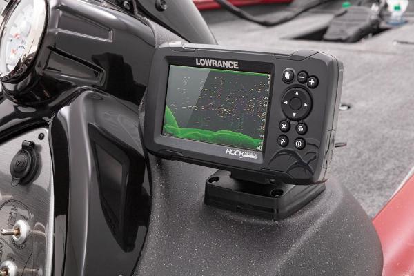 A Lowrance fish finder is mounted on the dashboard of a Tracker Pro Team 175 TXW boat.