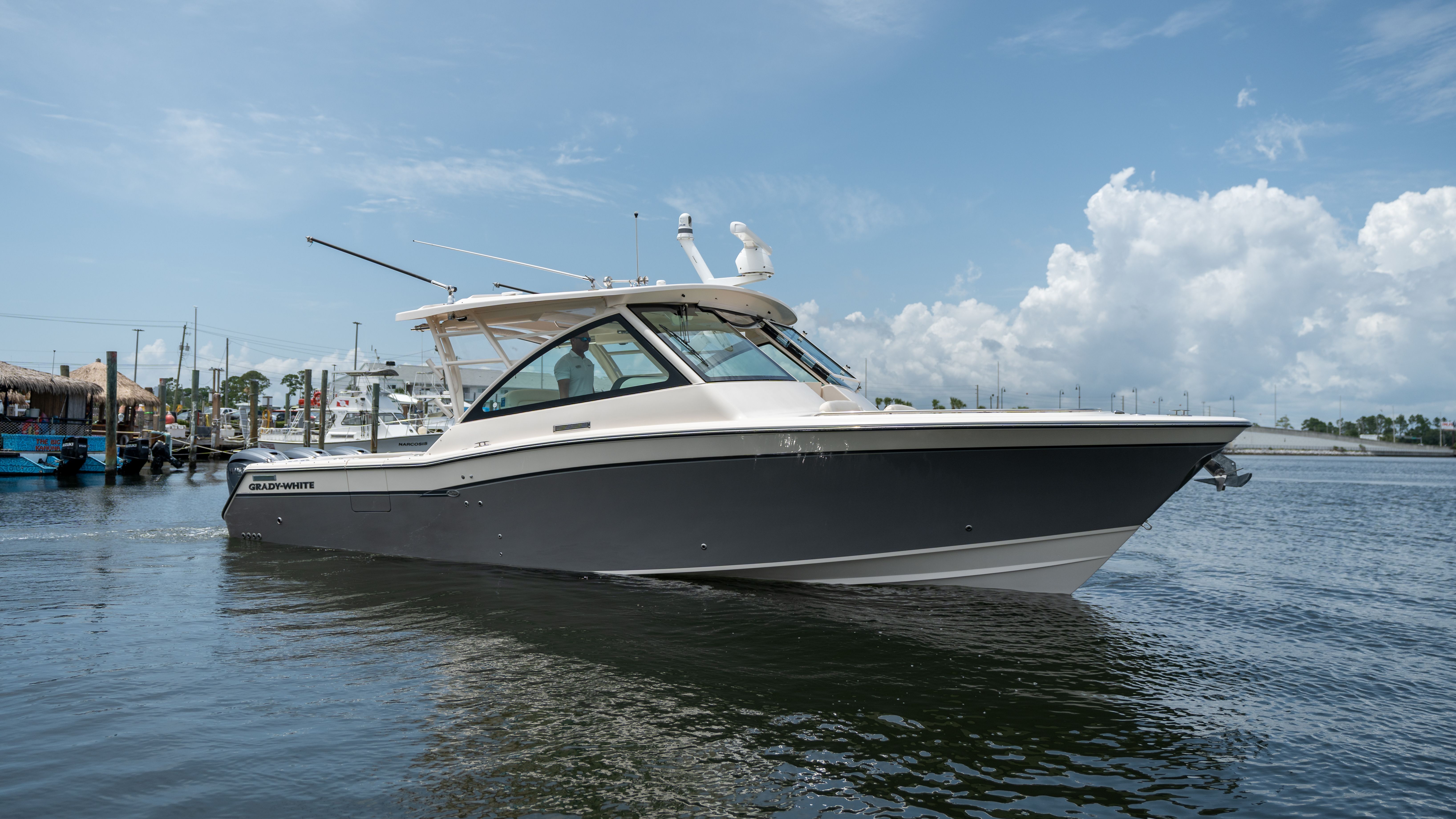 2019 Grady-White 375 Freedom on the water, featuring sleek design and spacious deck.