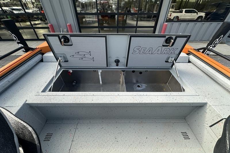 2026 SeaArk ProCat 240 boat with open storage compartments and fish graphics.