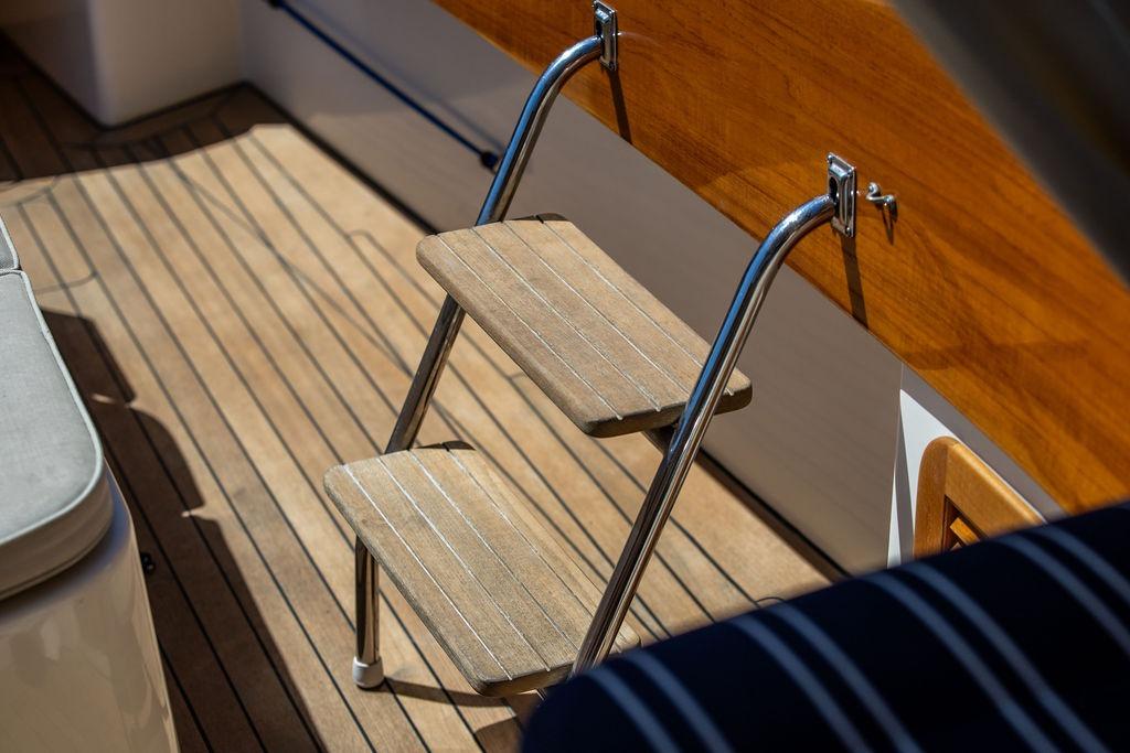 Teak deck and ladder on 2000 Hinckley Picnic Boat 36 Classic.