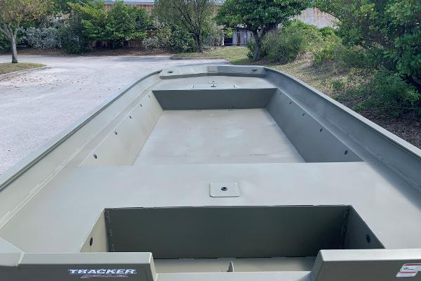 2025 Tracker GRIZZLY 2072 Utility boat, spacious interior, parked outdoors.