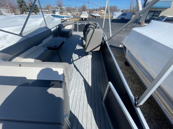 2025 Armada Saphir 23CR boat interior with seating and steering console.