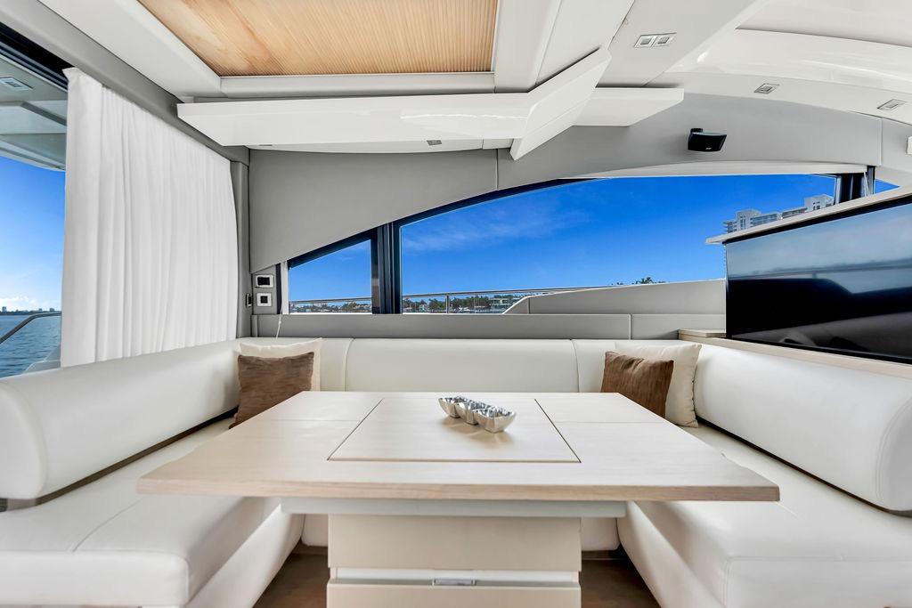 Luxurious interior of 2012 Fairline Targa 58 yacht with elegant seating and ocean view.