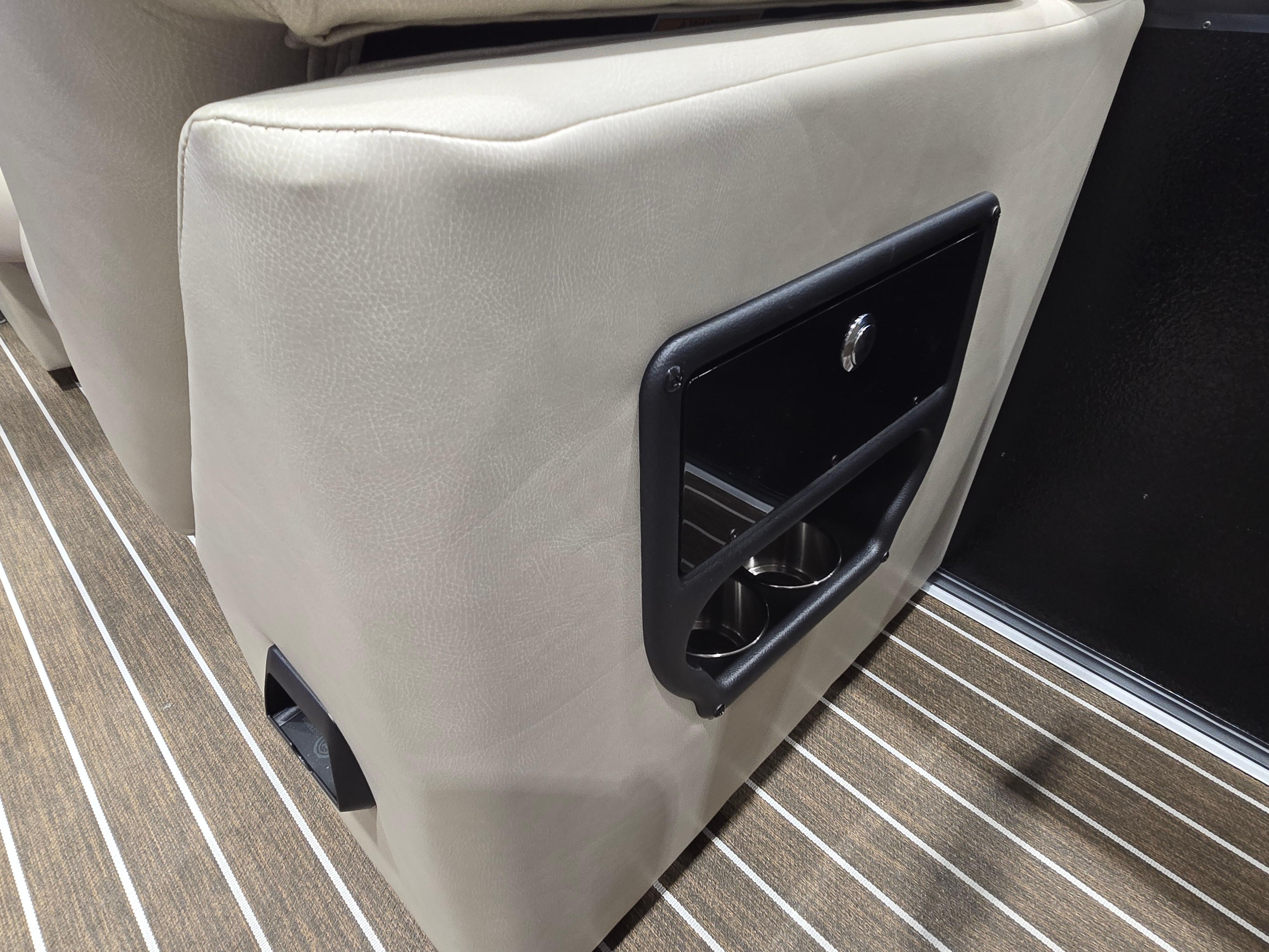 2025 Premier Intrigue interior with beige upholstery and built-in cup holders.