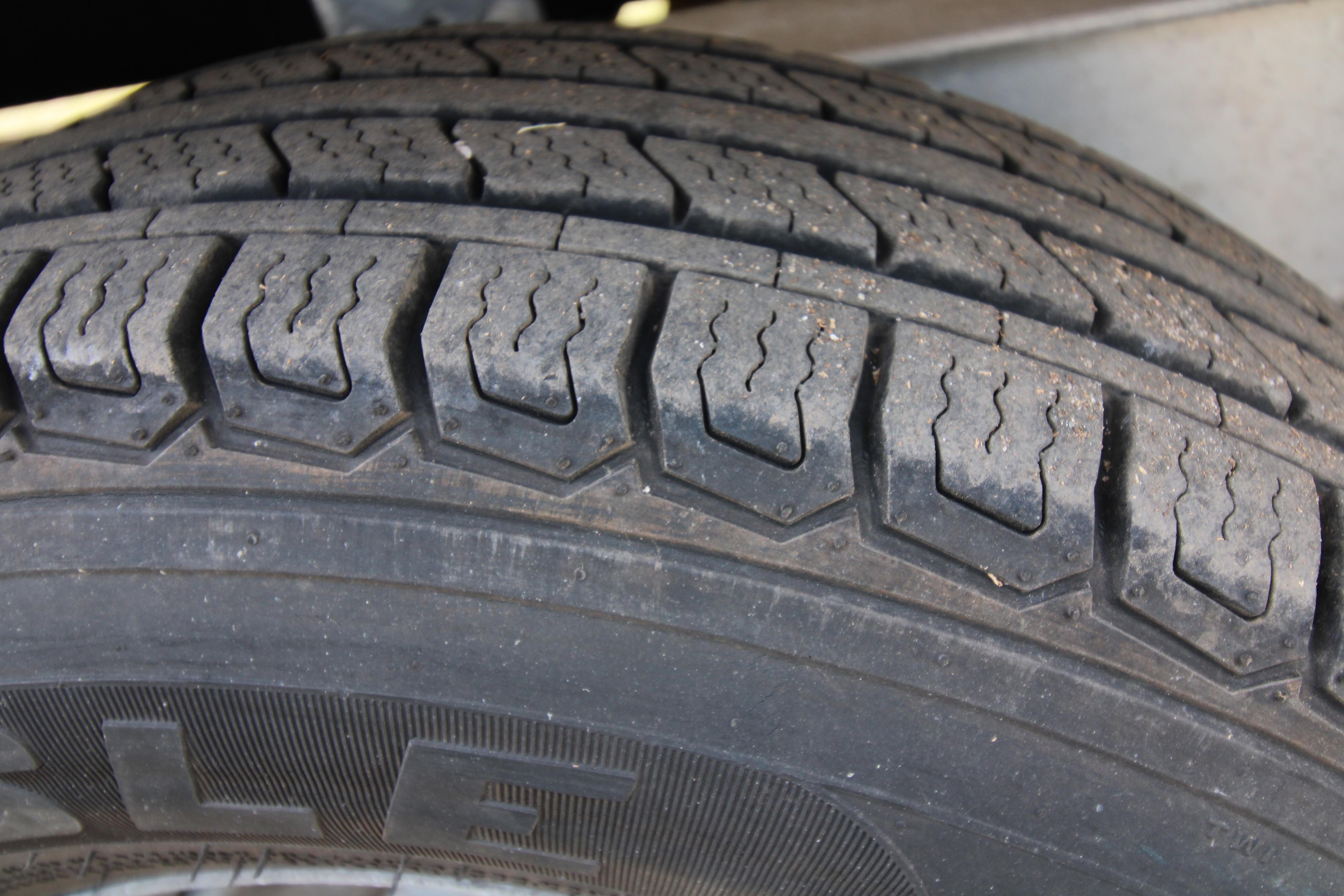 Close-up of a tire tread pattern on a 2022 Edgewater 280CC.