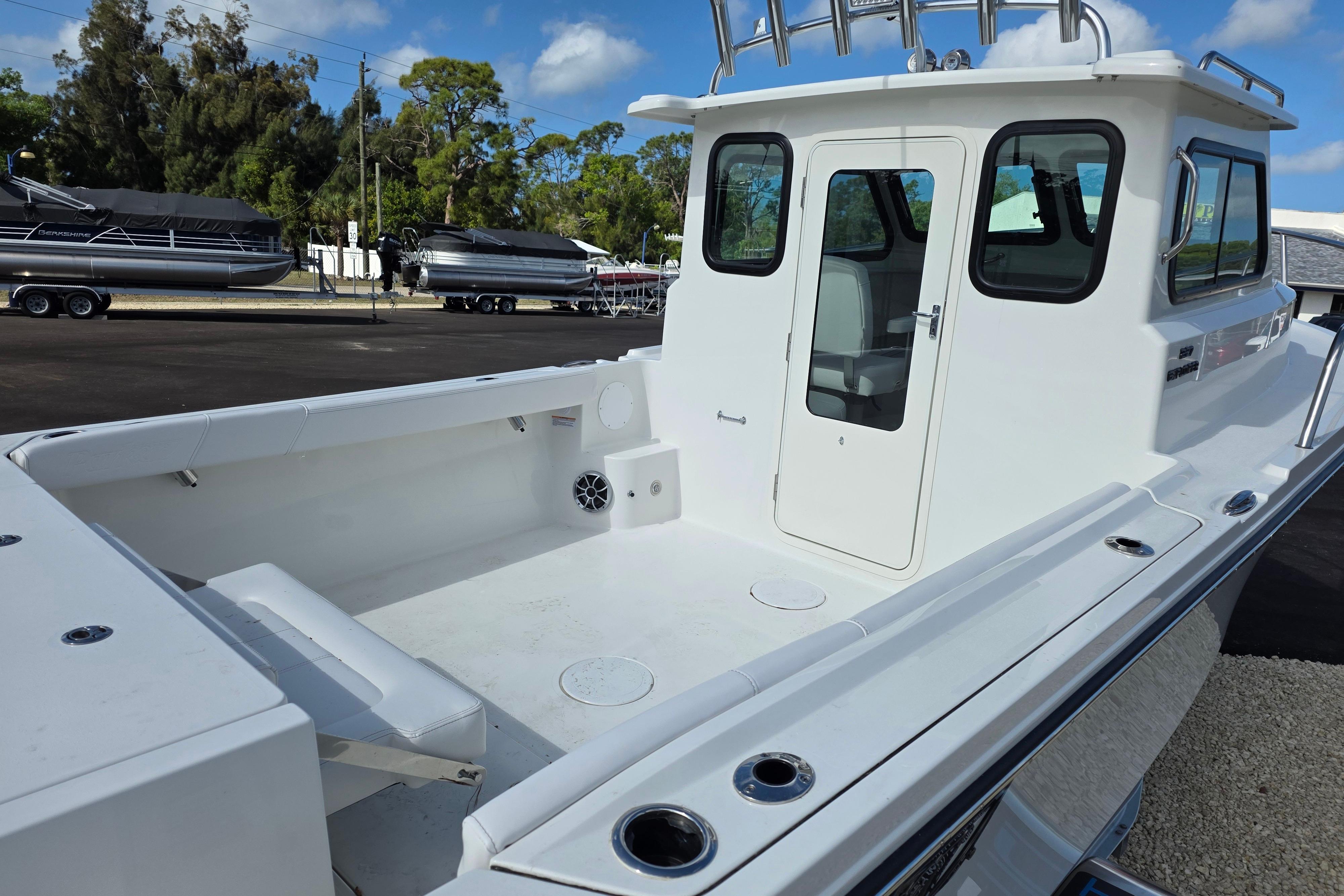 2026 Parker 227 Explorer boat with spacious deck and modern cabin design.