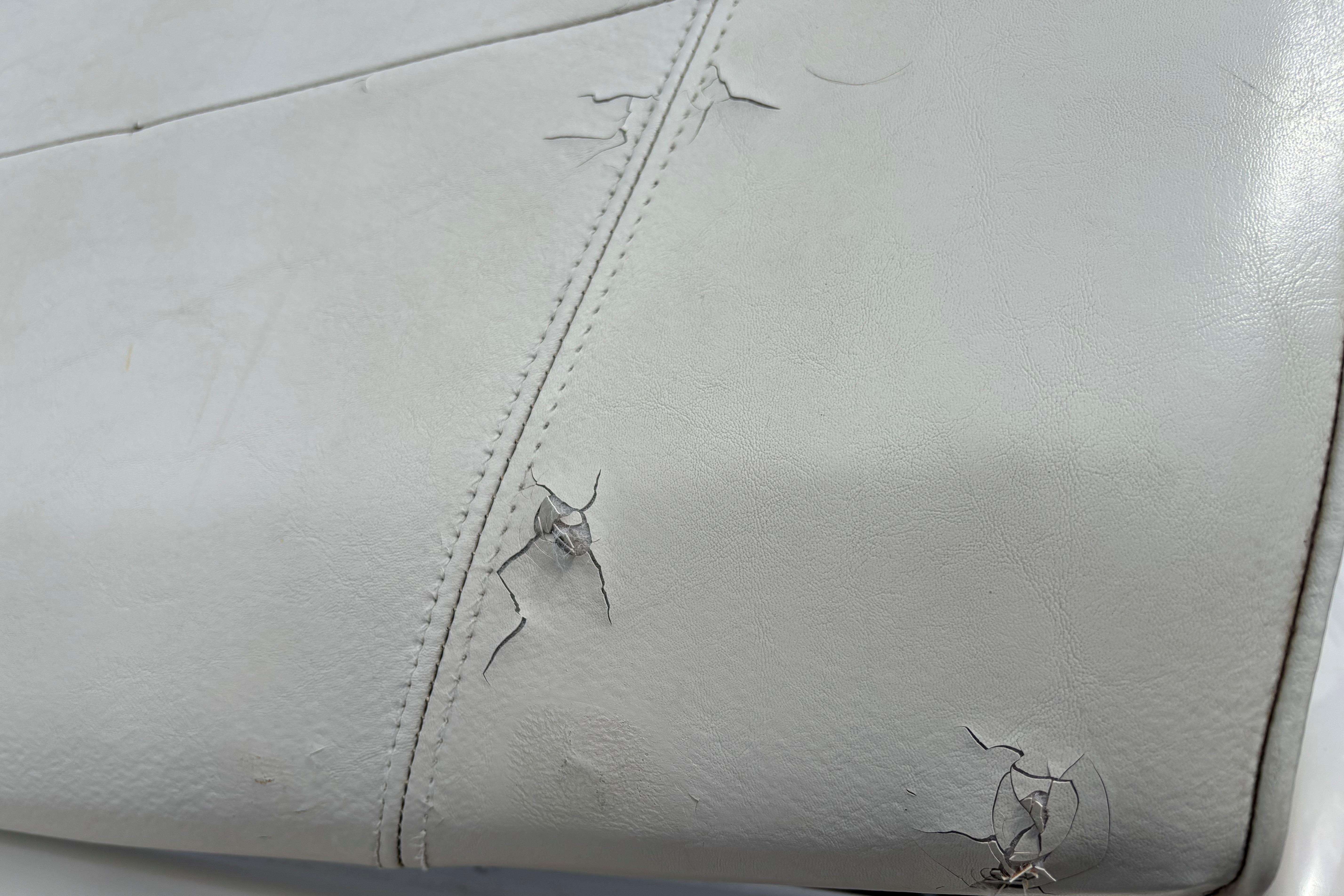 Cracked upholstery on 1999 MasterCraft 205 PRO STAR boat seat.