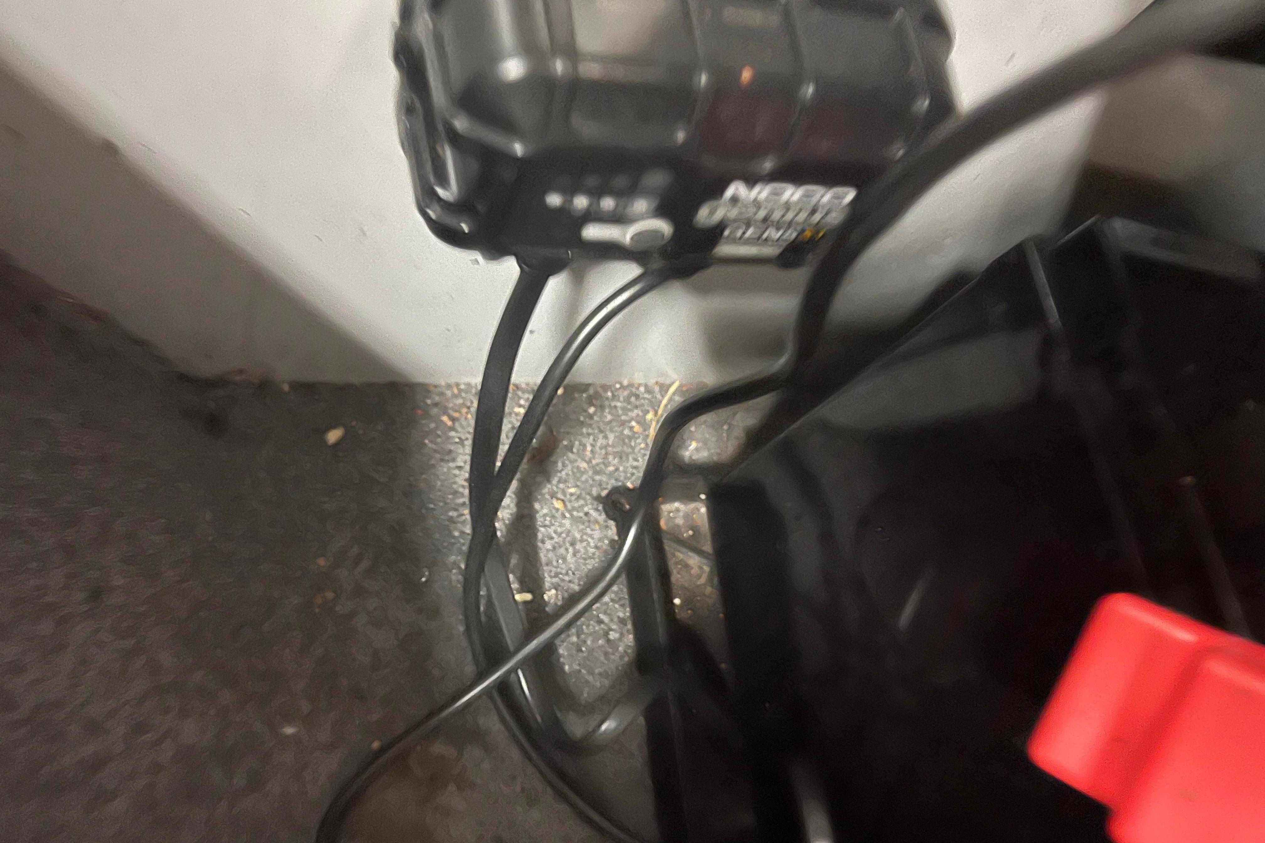 Battery charger setup in a 2022 Tracker Pro Guide V-16 WT boat.