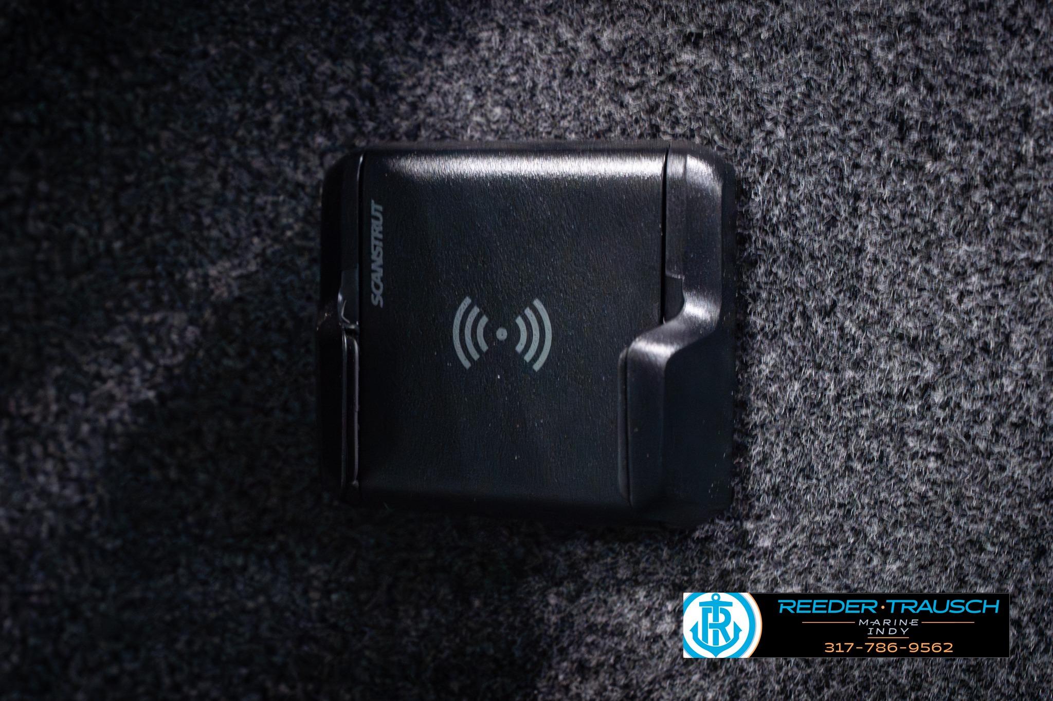 Wireless charging pad on 2026 Lund 1650 Rebel XL SS boat, featuring Scanstrut technology.