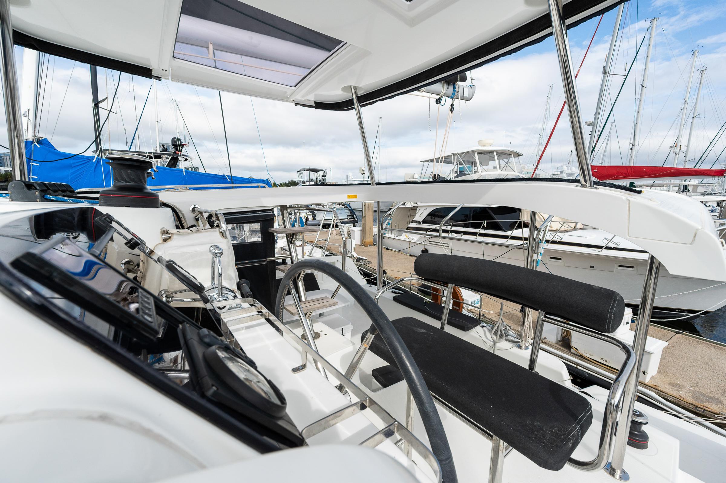 Cockpit view of 2018 Lagoon 42 catamaran at marina.