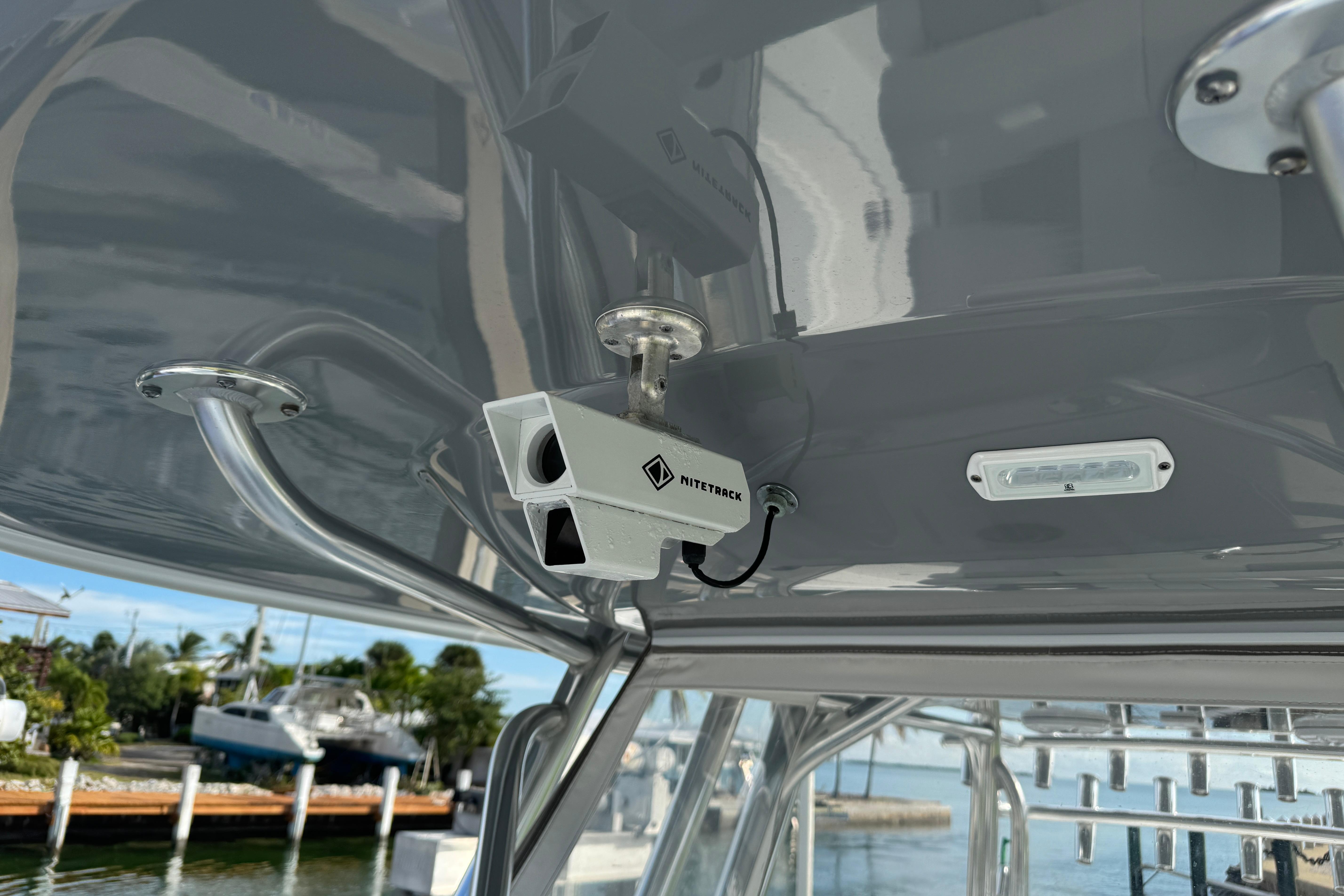 Security camera installed on Freeman 34VH boat, 2022 model, with sleek metallic framework.