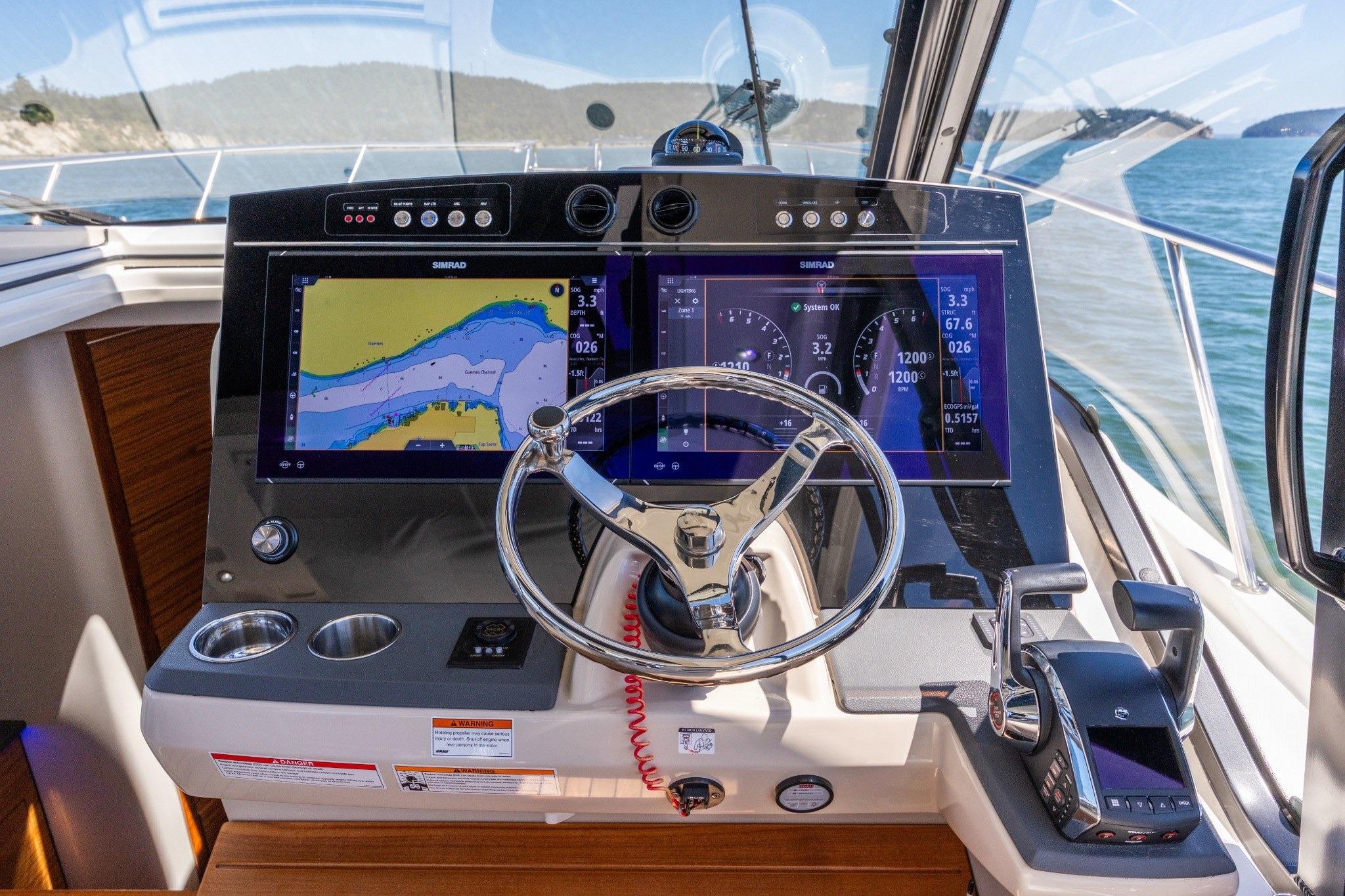 2023 Boston Whaler 405 Conquest helm with advanced navigation displays and controls.