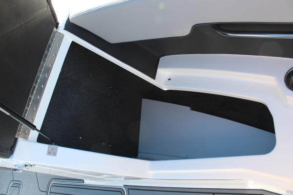Interior view of 2025 Cobalt CS23 boat storage compartment.