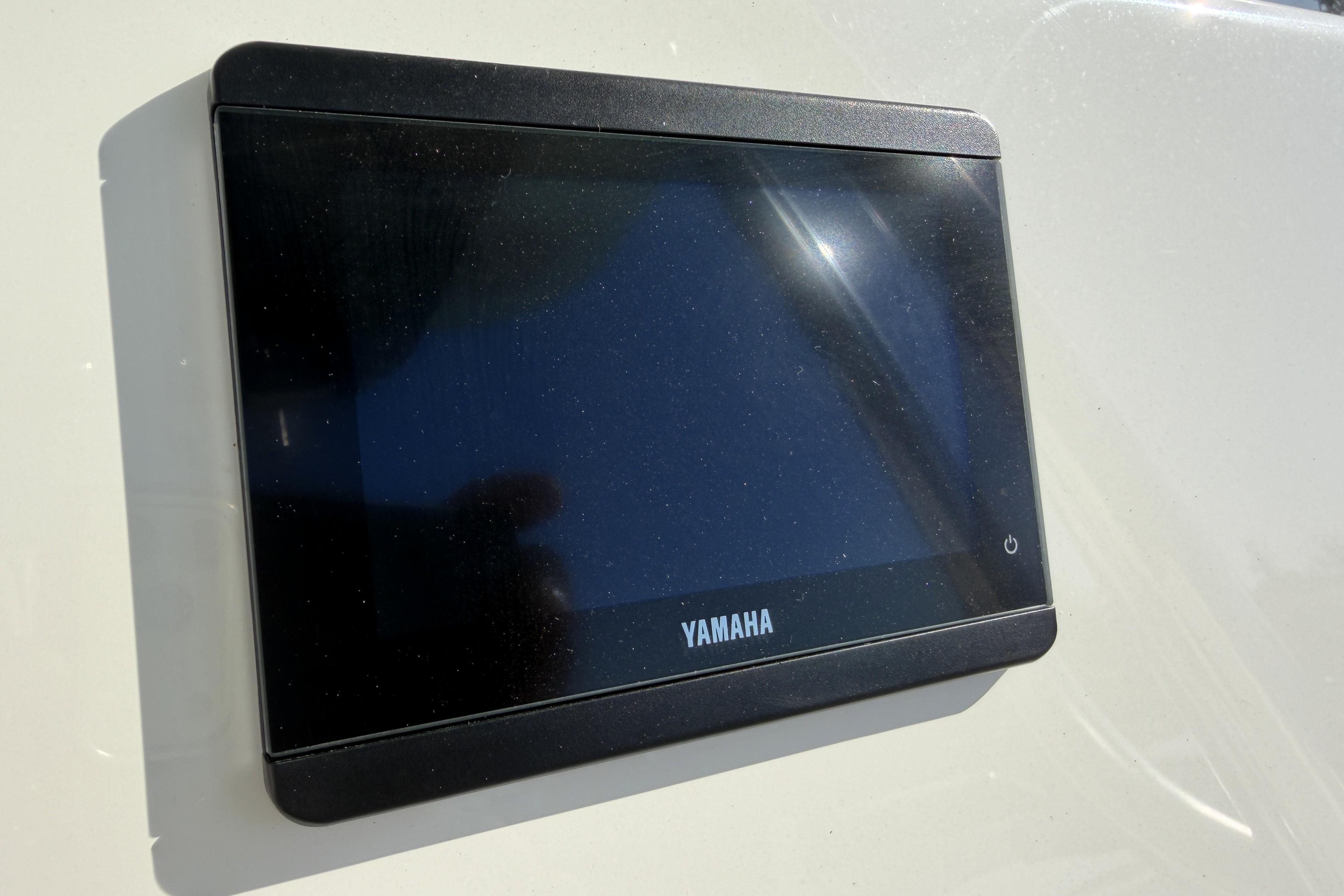 Yamaha display screen on 2025 Key West 239 FS boat dashboard.