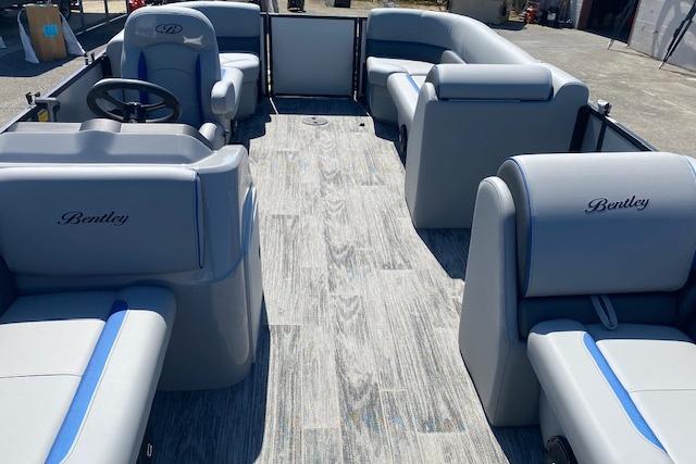 Interior of a 2026 Bentley Pontoons Bolt with gray and blue seating.