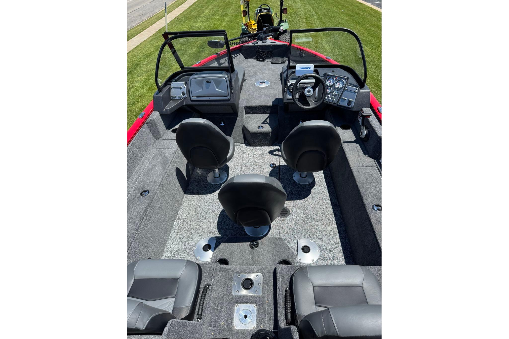 2026 Tracker Pro Guide V-16 WT boat interior with seating and control panel.