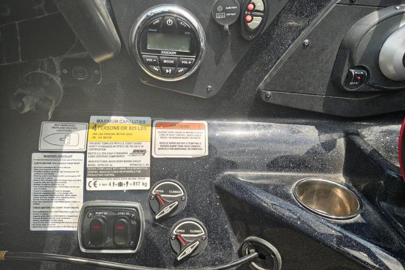 Control panel of a 2022 Nitro Z21 XL Pro boat with gauges and switches.