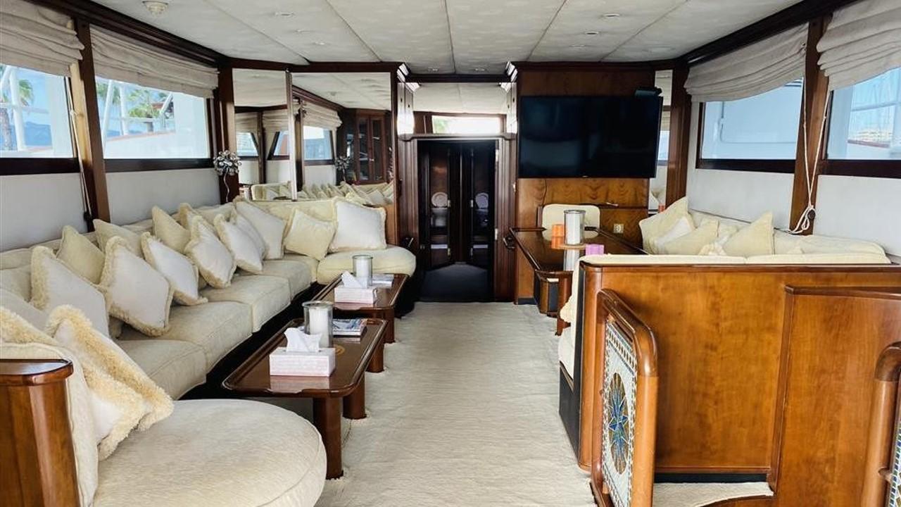 Luxurious interior of 2005 Explorer Motor Yachts 28M with plush seating and elegant decor.