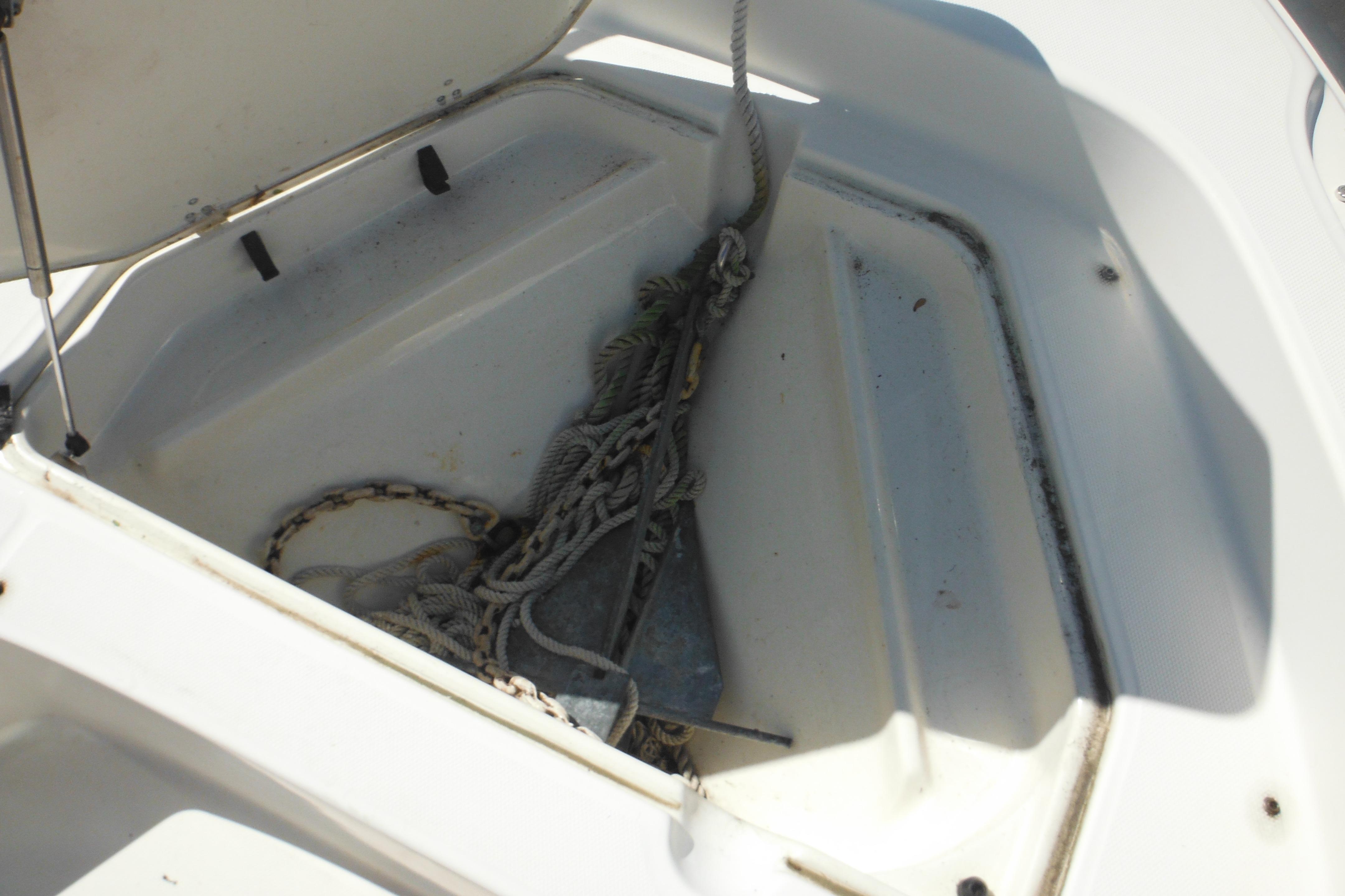 Anchor storage compartment on a 2009 Boston Whaler 200 Dauntless boat.