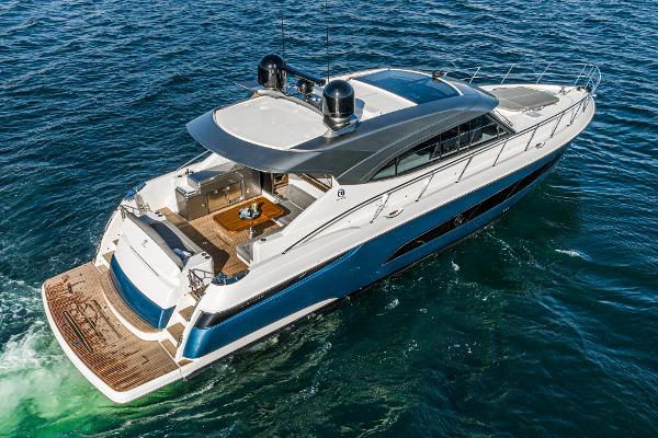 2021 Riviera 5400 Sport Yacht cruising on open water.
