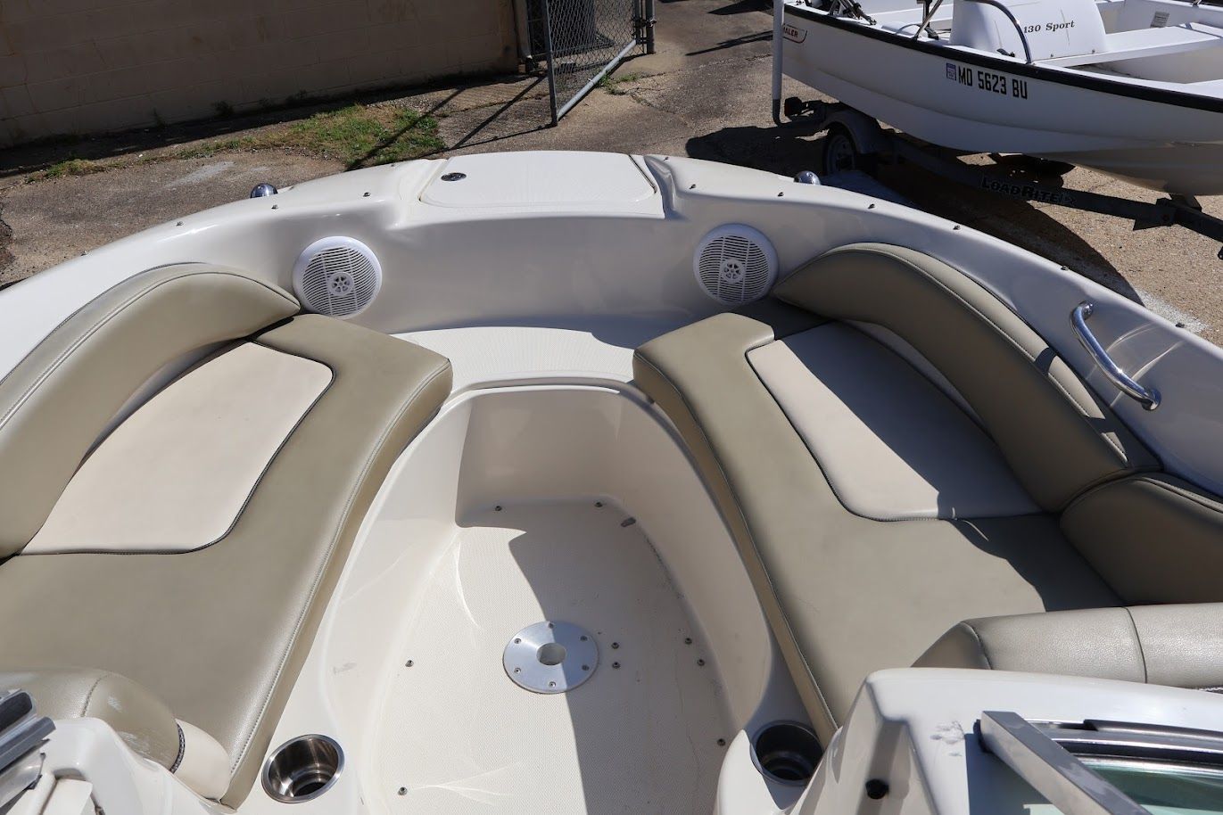 Interior of a 2006 Sea Ray Sun Deck 200 boat with seating.