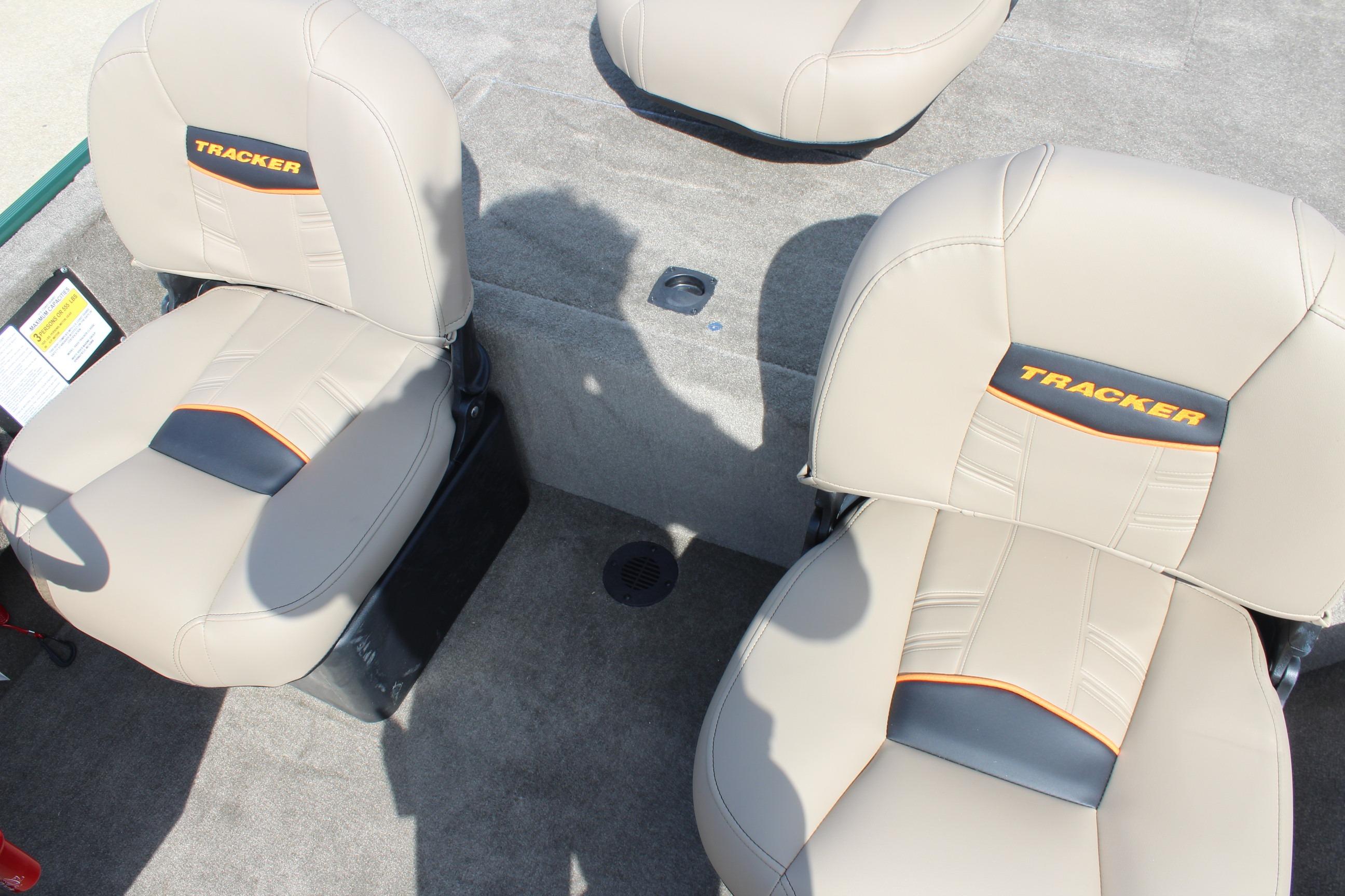 2026 Tracker Bass Tracker Classic Limited boat seats with beige upholstery and logo detailing.
