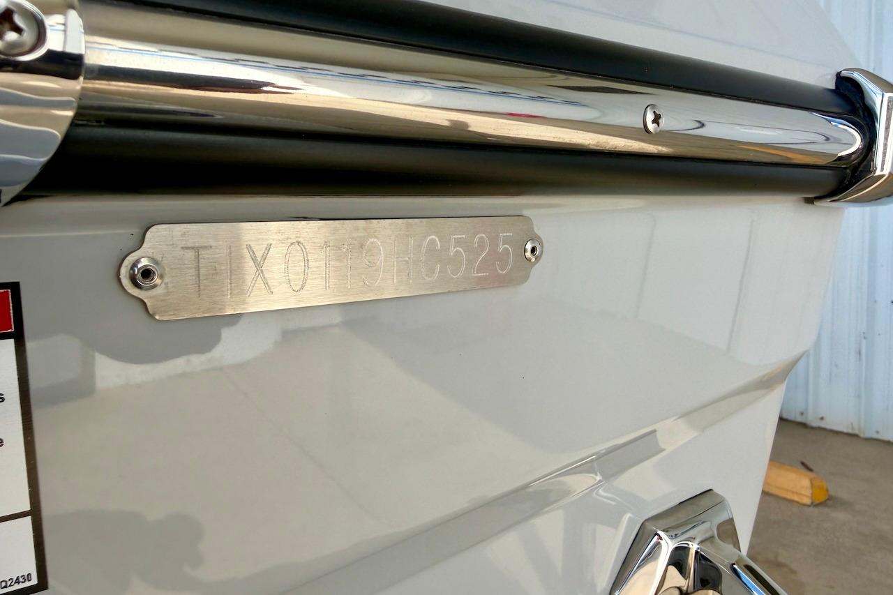 2025 Tigé Ultré 25ZX boat hull identification number plate close-up.