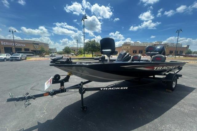 2026 Tracker Pro Team 175 Crappie Edition boat on trailer under blue sky.