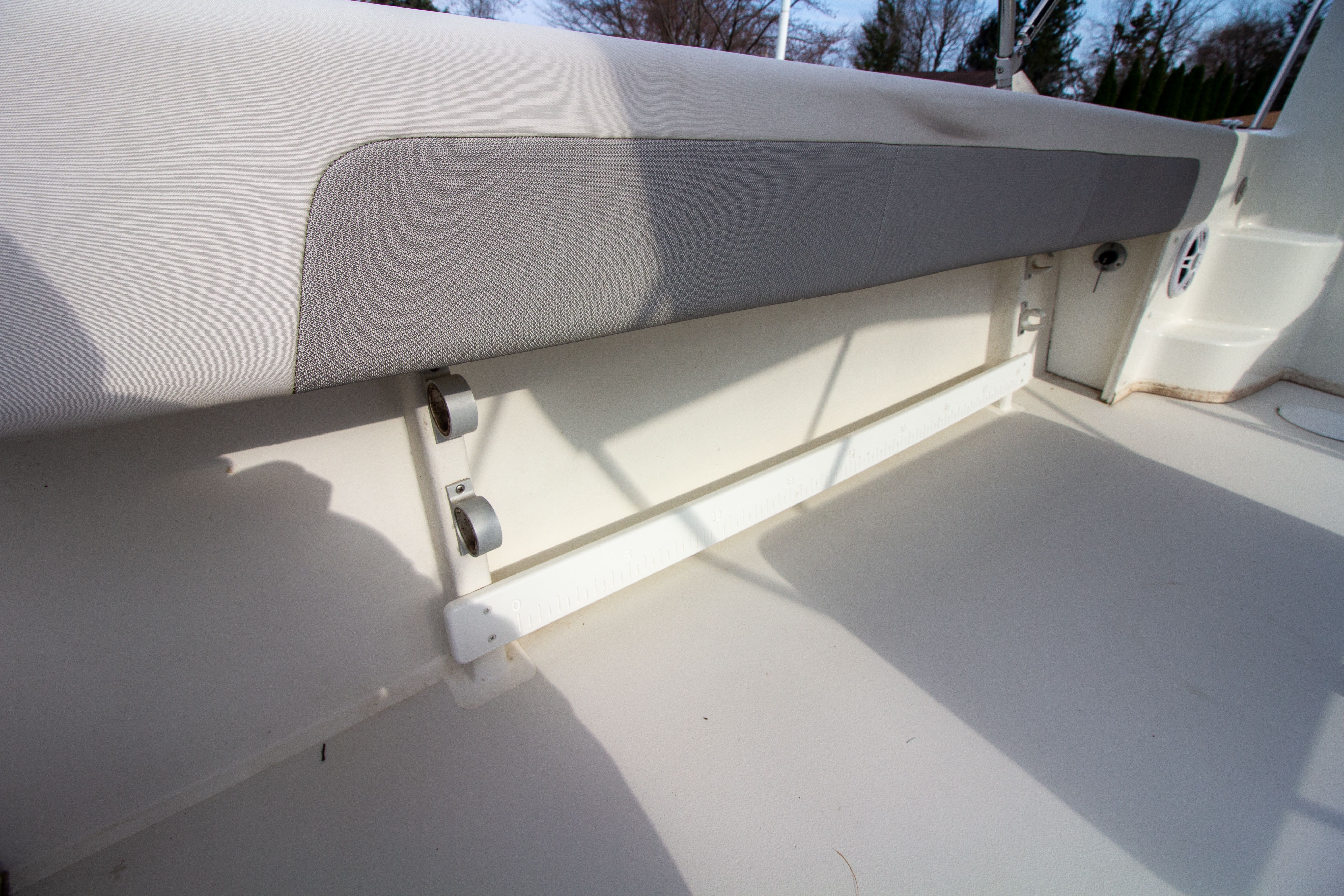 Interior of 2022 Parker 2520 XLD Sport Cabin with gray seat cushion.